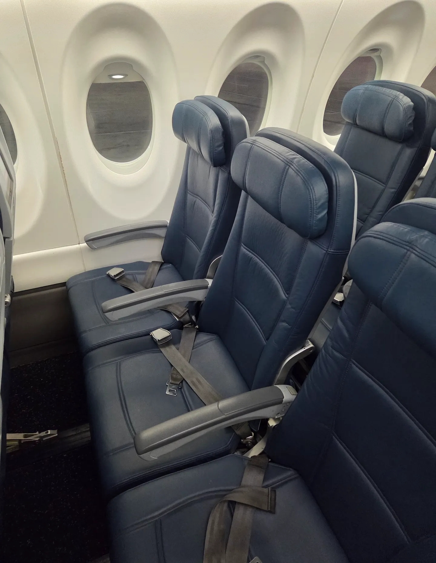 Delta Air Lines A220-100 Main Cabin seats and overhead bins