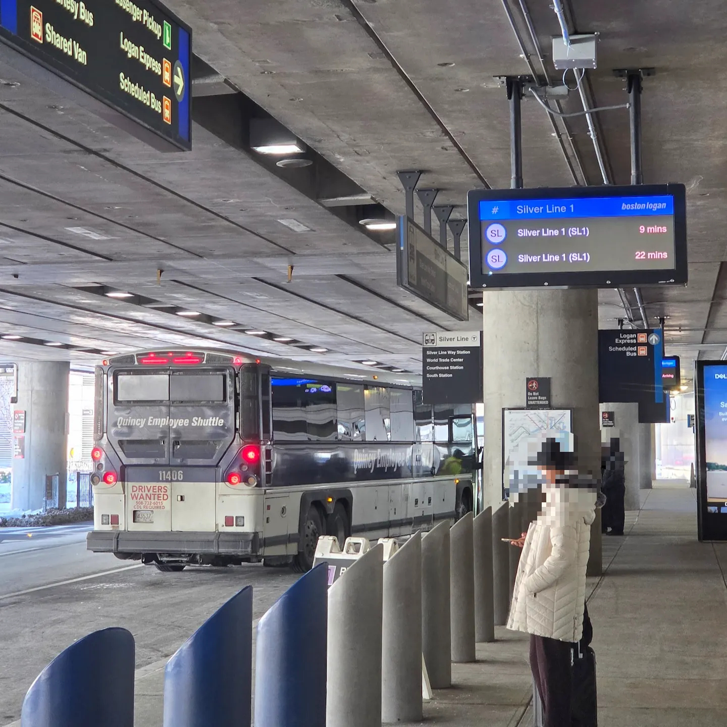 Boston Logan International Airport baggage claim area and Silver Line stop