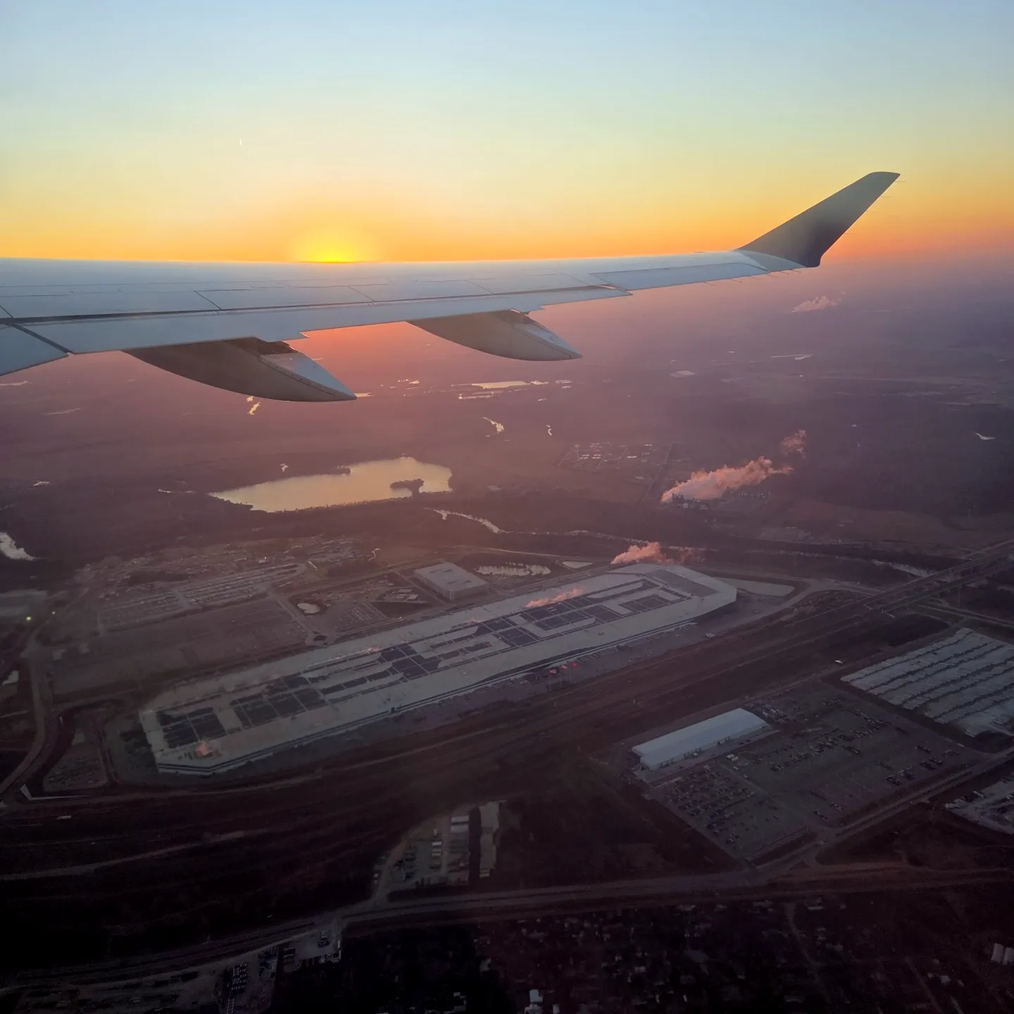 DL2098 flying over Tesla Gigafactory Texas and cabin view during cruise