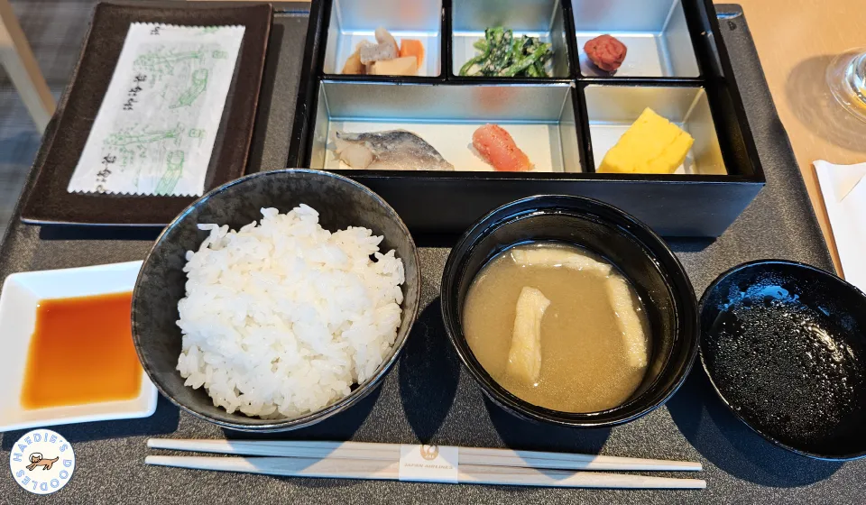 JAL First Class Lounge Salon Area with Yamazaki Whisky
