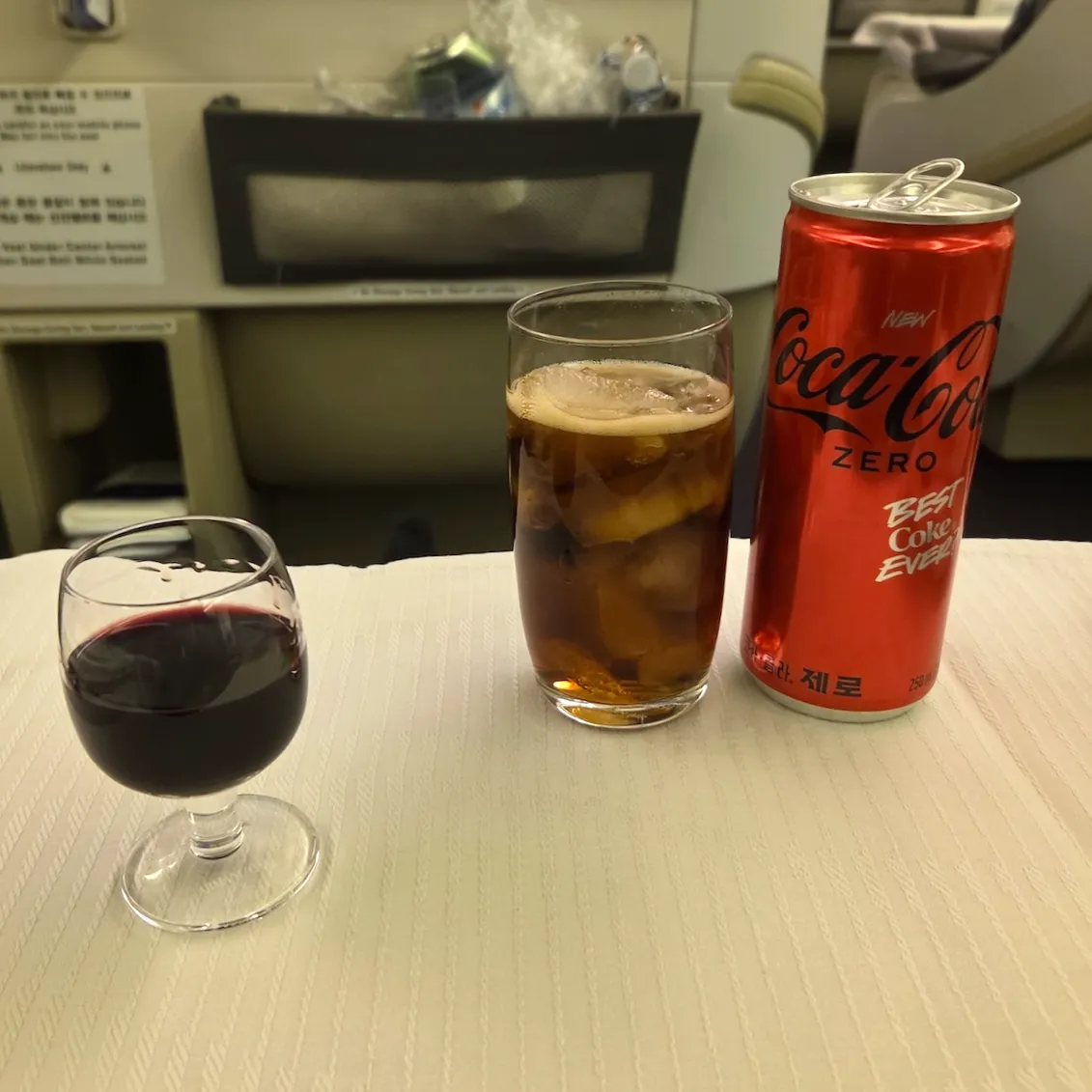 Champagne, Non-Alcoholic Beer, Port Wine, and Coke Zero Enjoyed in Korean Air Prestige Class